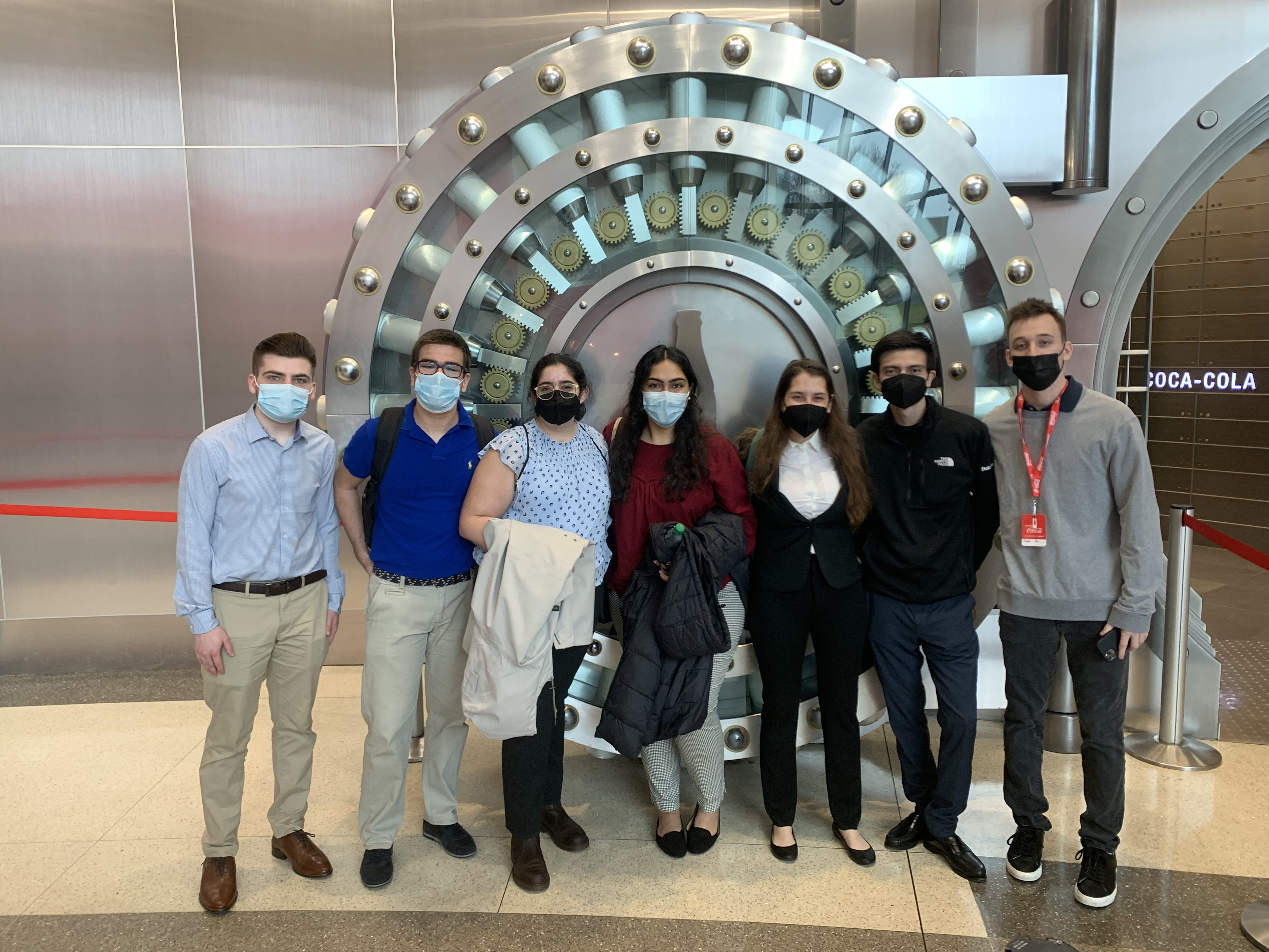 Students outside the vault at World of Coke.